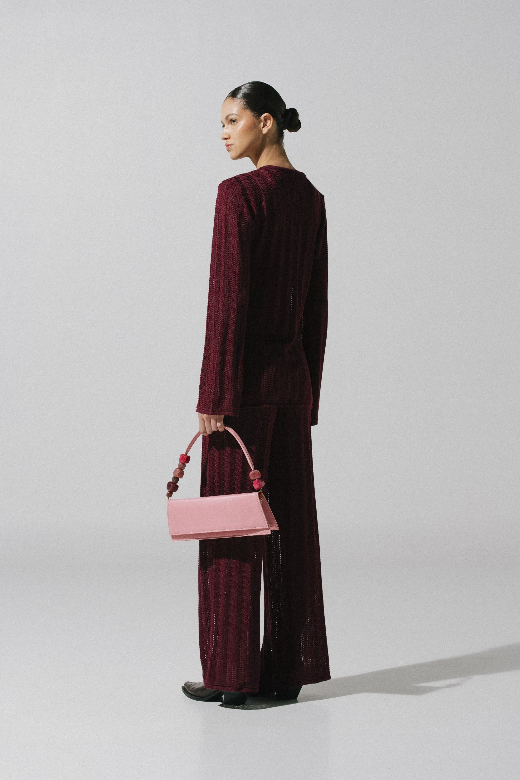 Burgundy Corsica Pants, back view with Wide silhouette and Unlined design.