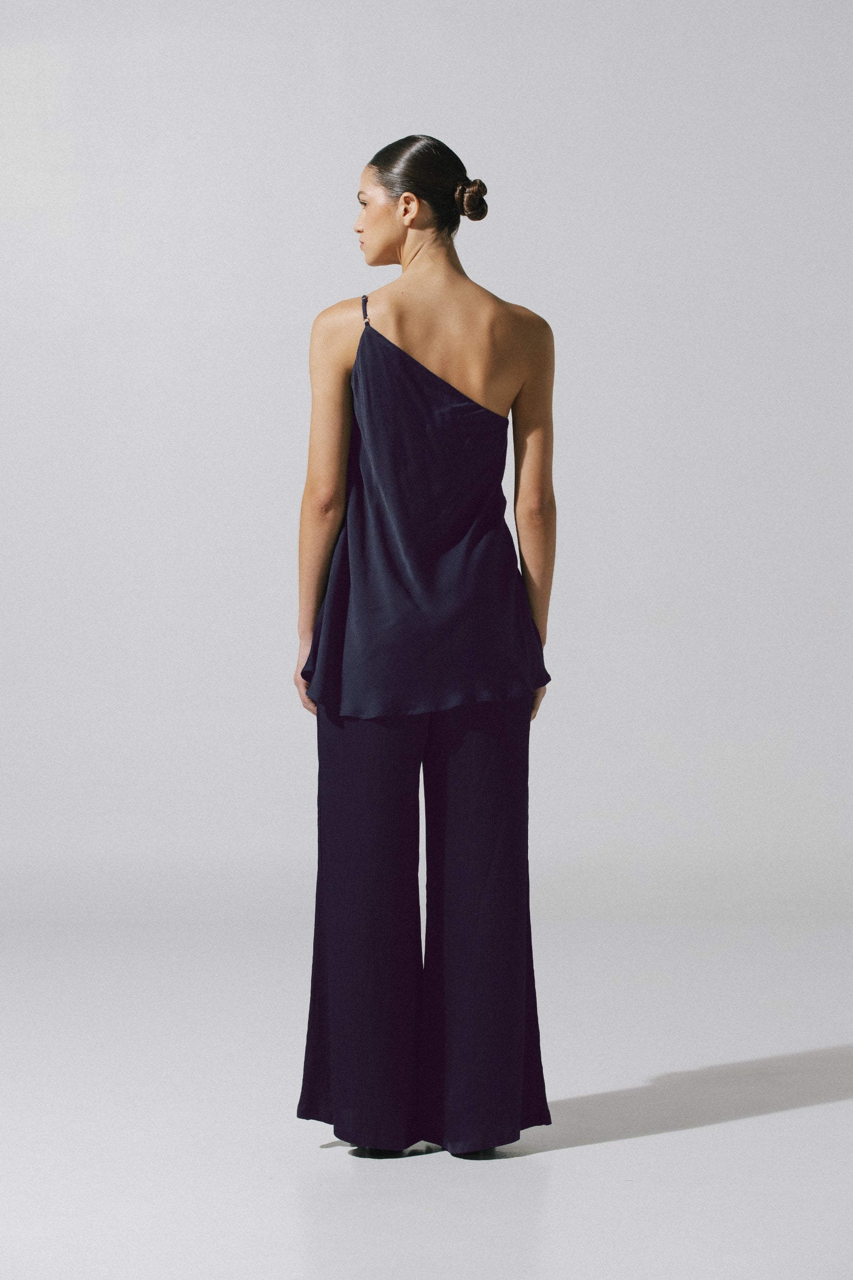 Ferrat Top by Baobab, side view with Embellished detail and asymmetrical neckline.