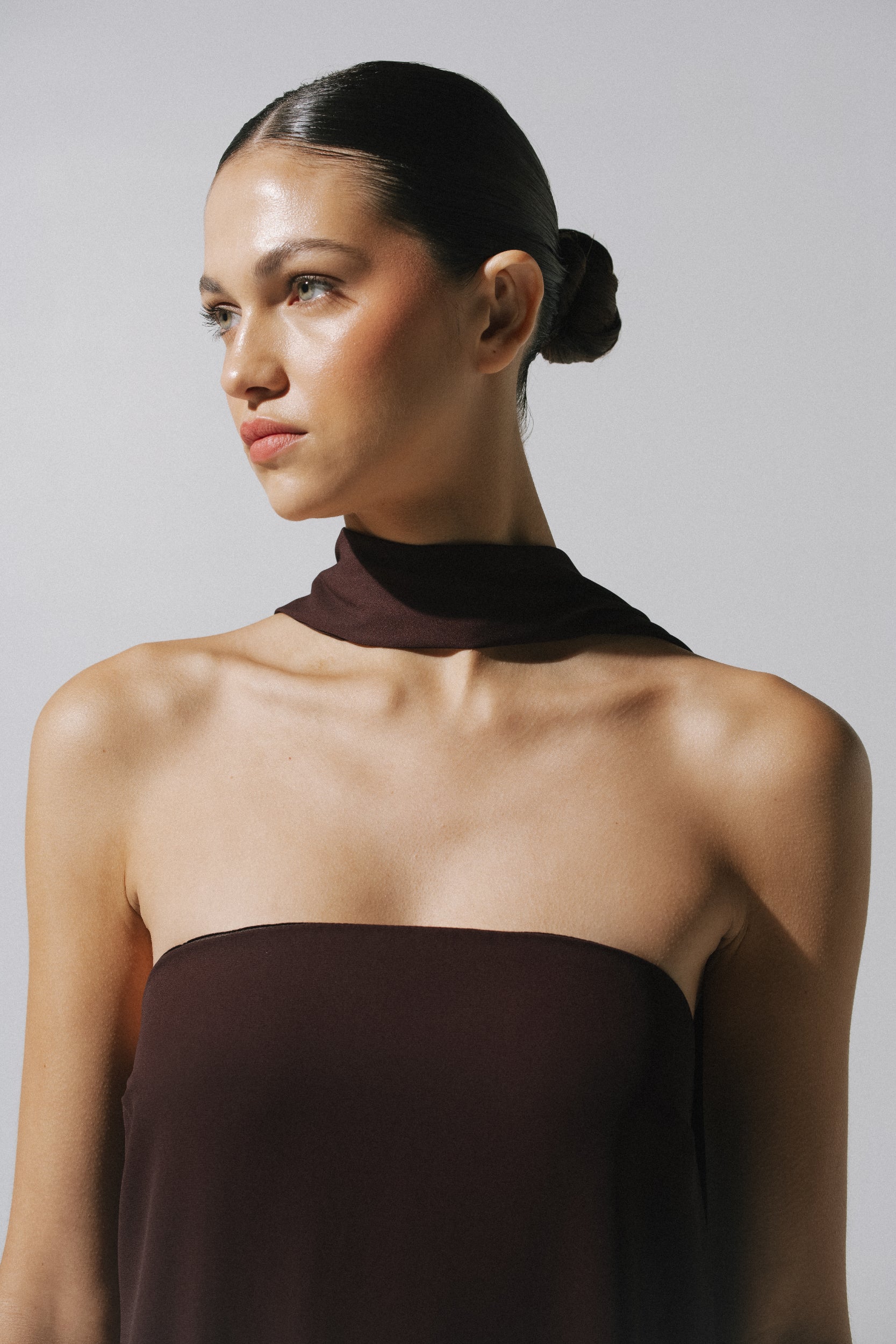 Chocolate El Dress with Darts on top, Scarf detail and fluid fall.