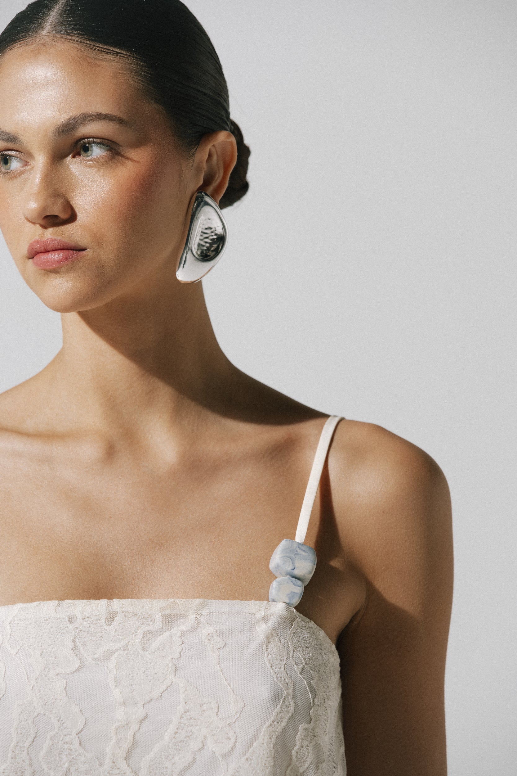 Ivory Porto Top, front view with Embellished detail and Fully lined.